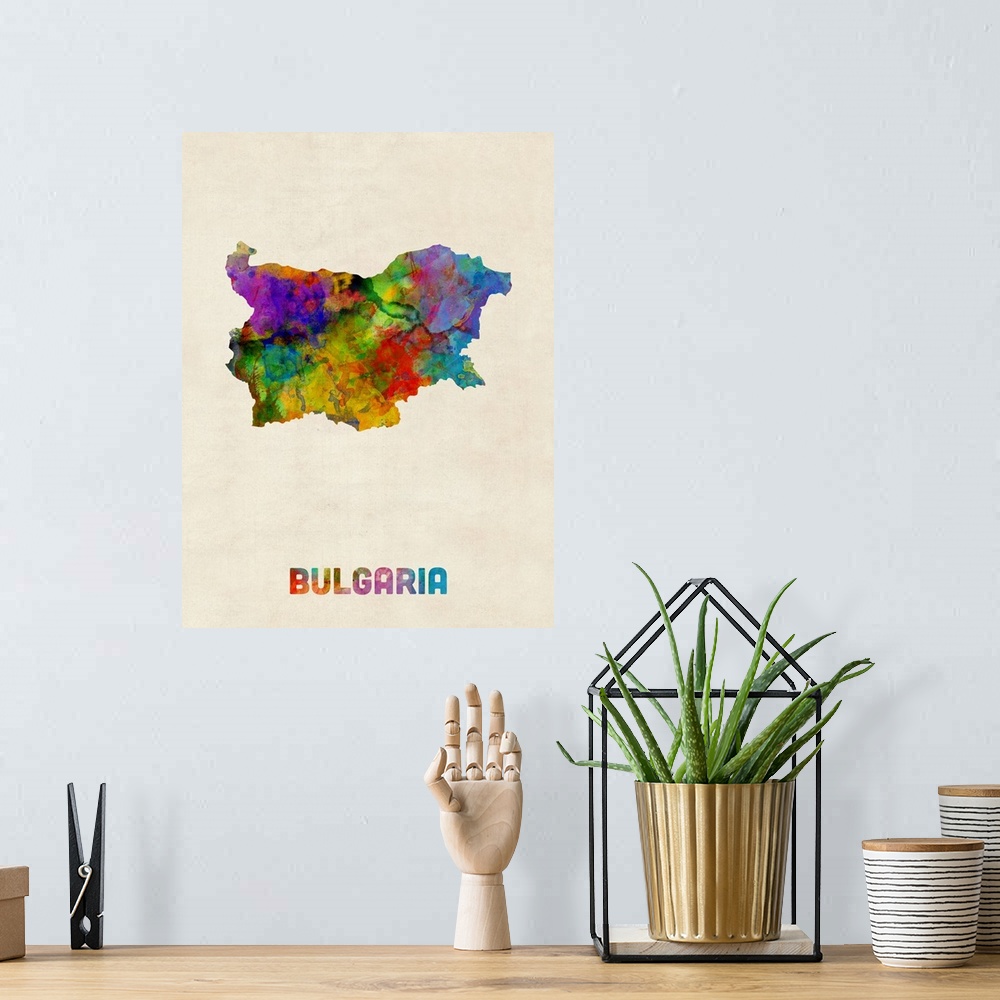 A bohemian room featuring A watercolor map of Bulgaria.