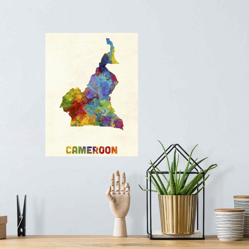 A bohemian room featuring A watercolor map of Cameroon