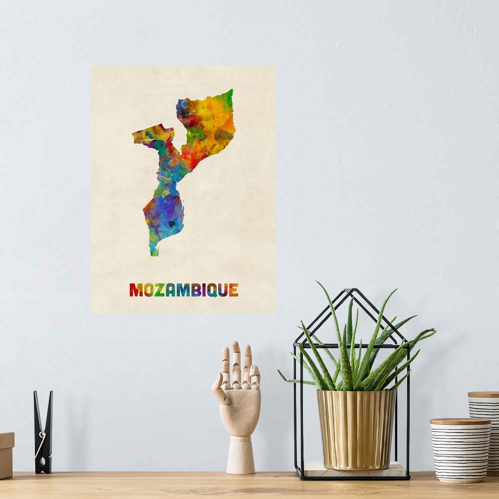 A bohemian room featuring A watercolor map of Mozambique.