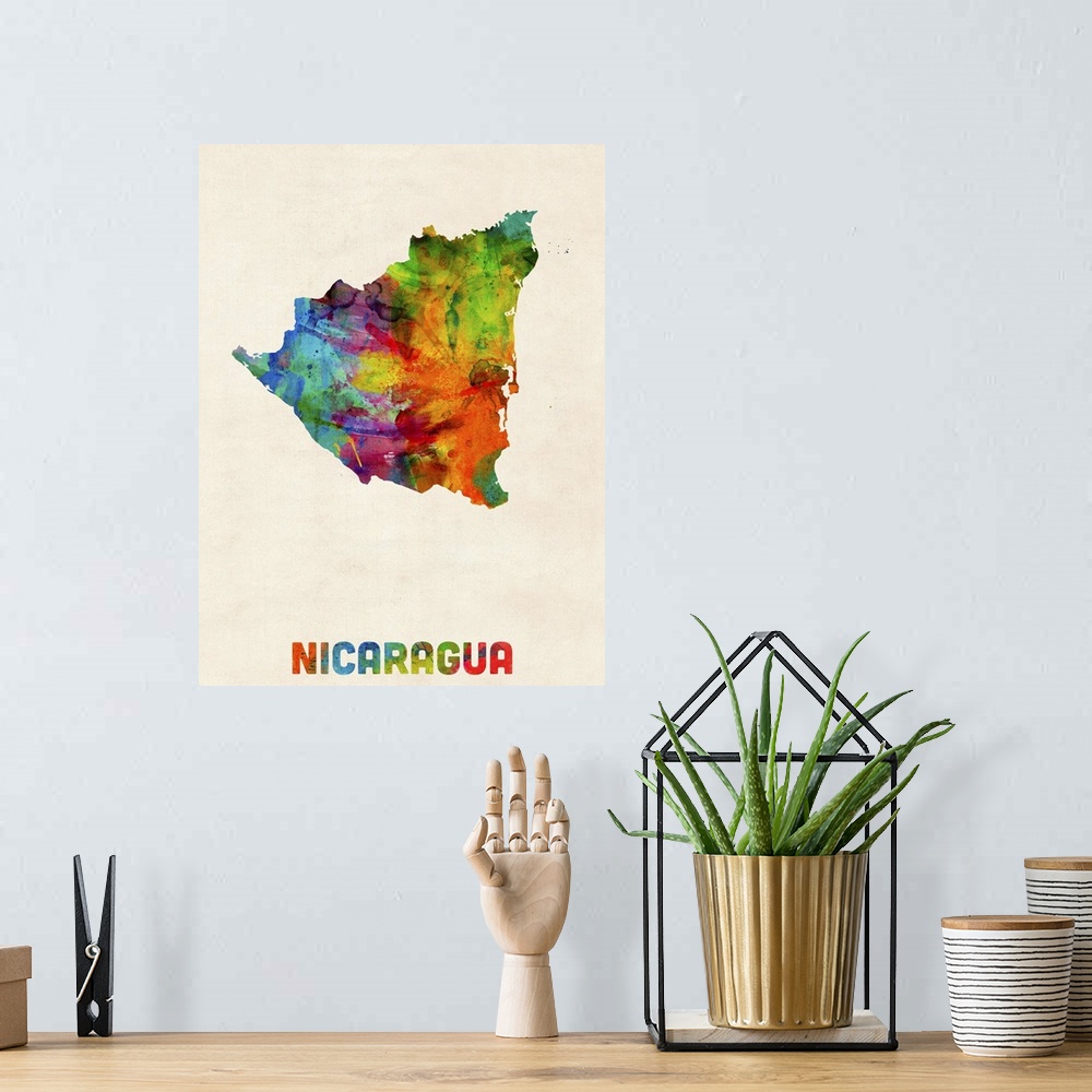 A bohemian room featuring Watercolor art map of the country Nicaragua against a weathered beige background.
