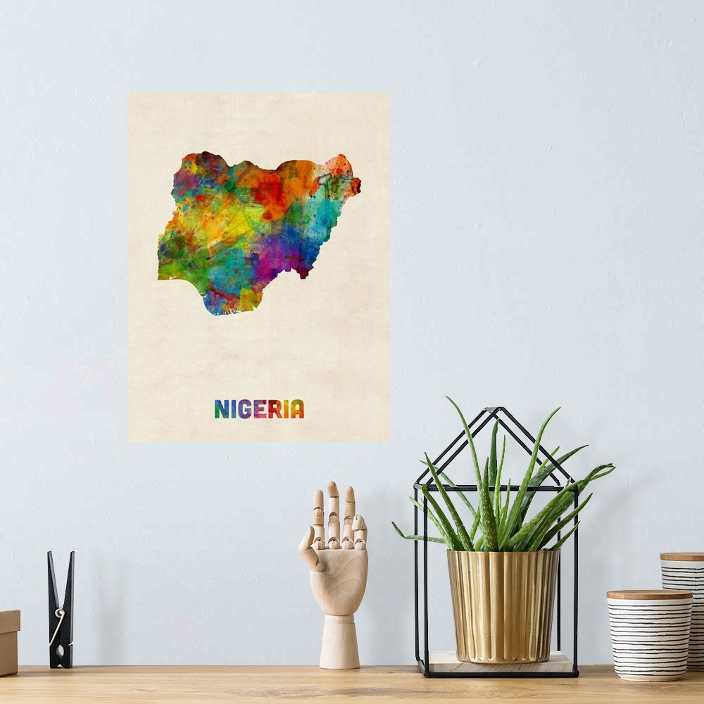A bohemian room featuring A watercolor map of Nigeria.
