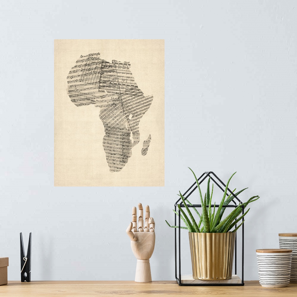 A bohemian room featuring Old Sheet Music Map of Africa Map