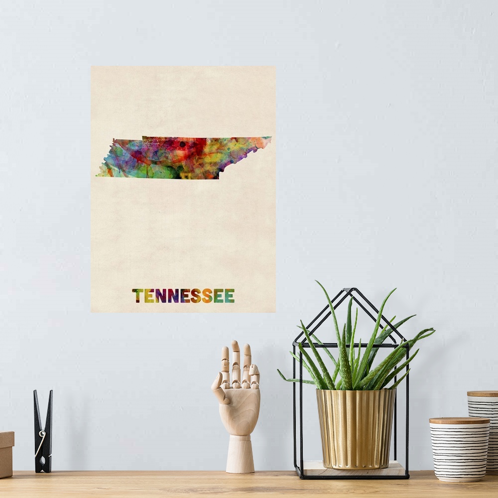 A bohemian room featuring Contemporary piece of artwork of a map of Tennessee made up of watercolor splashes.