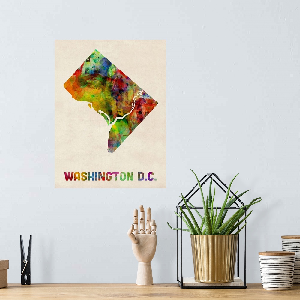 A bohemian room featuring Contemporary piece of artwork of a map of Washington DC made up of watercolor splashes.