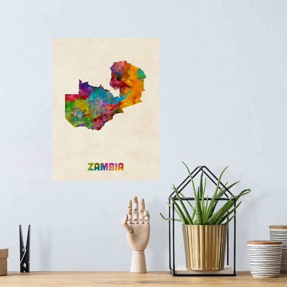 A bohemian room featuring A watercolor map of Zambia.