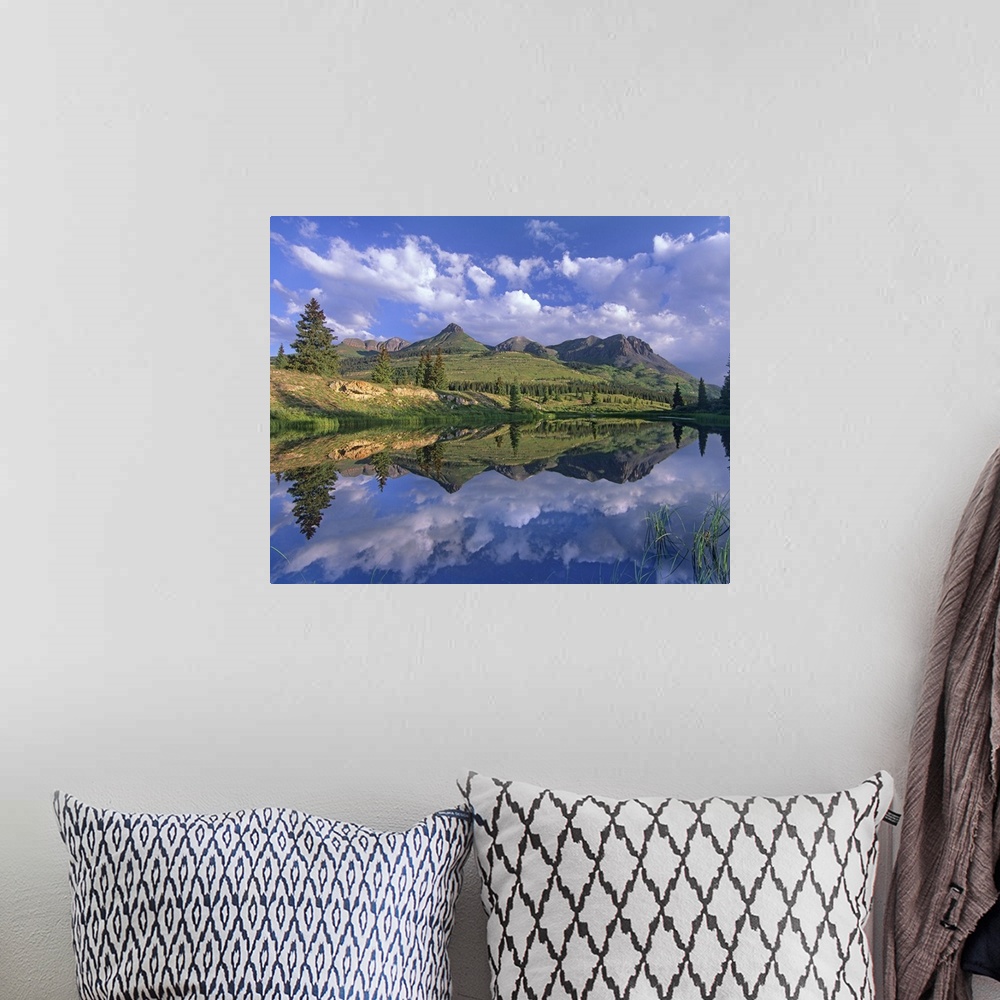 A bohemian room featuring Grand Turk and Sultan Mountain reflected in Molas Lake, Colorado