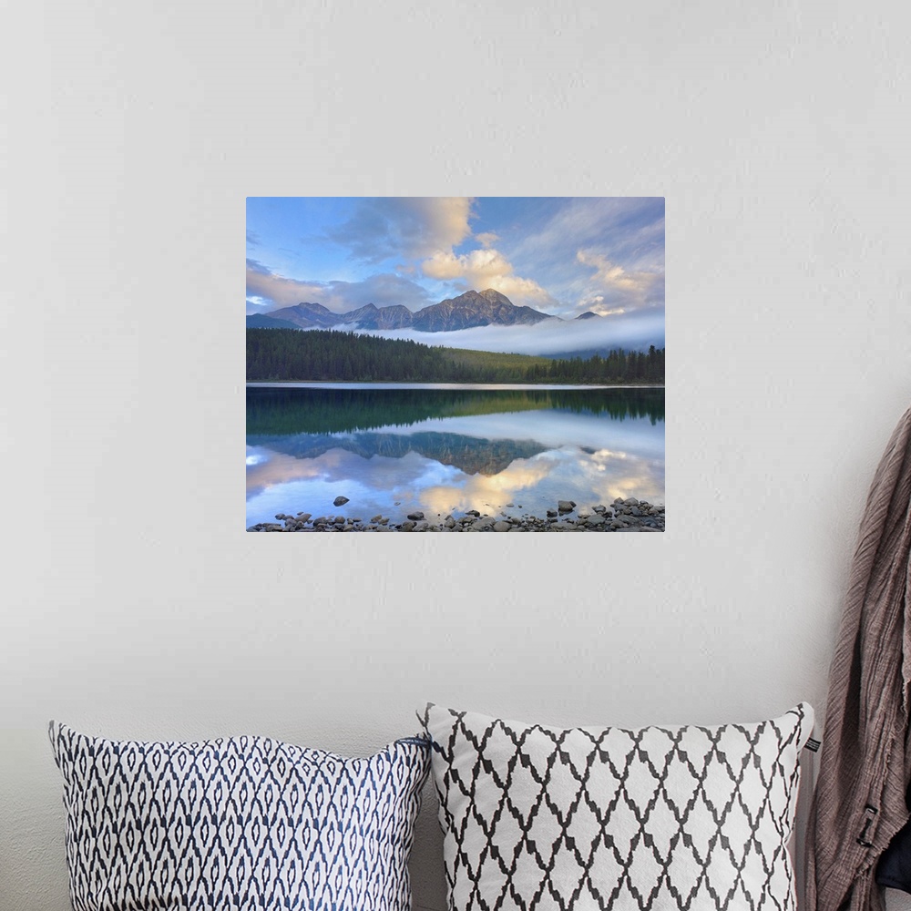 A bohemian room featuring Pyramid Mountain and forest reflected in Patricia Lake, Jasper National Park, Canada