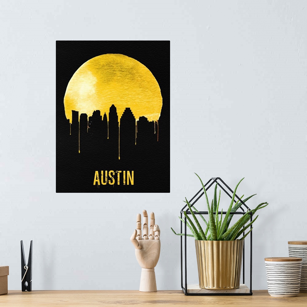 A bohemian room featuring Contemporary watercolor artwork of the Austin city skyline, in silhouette.