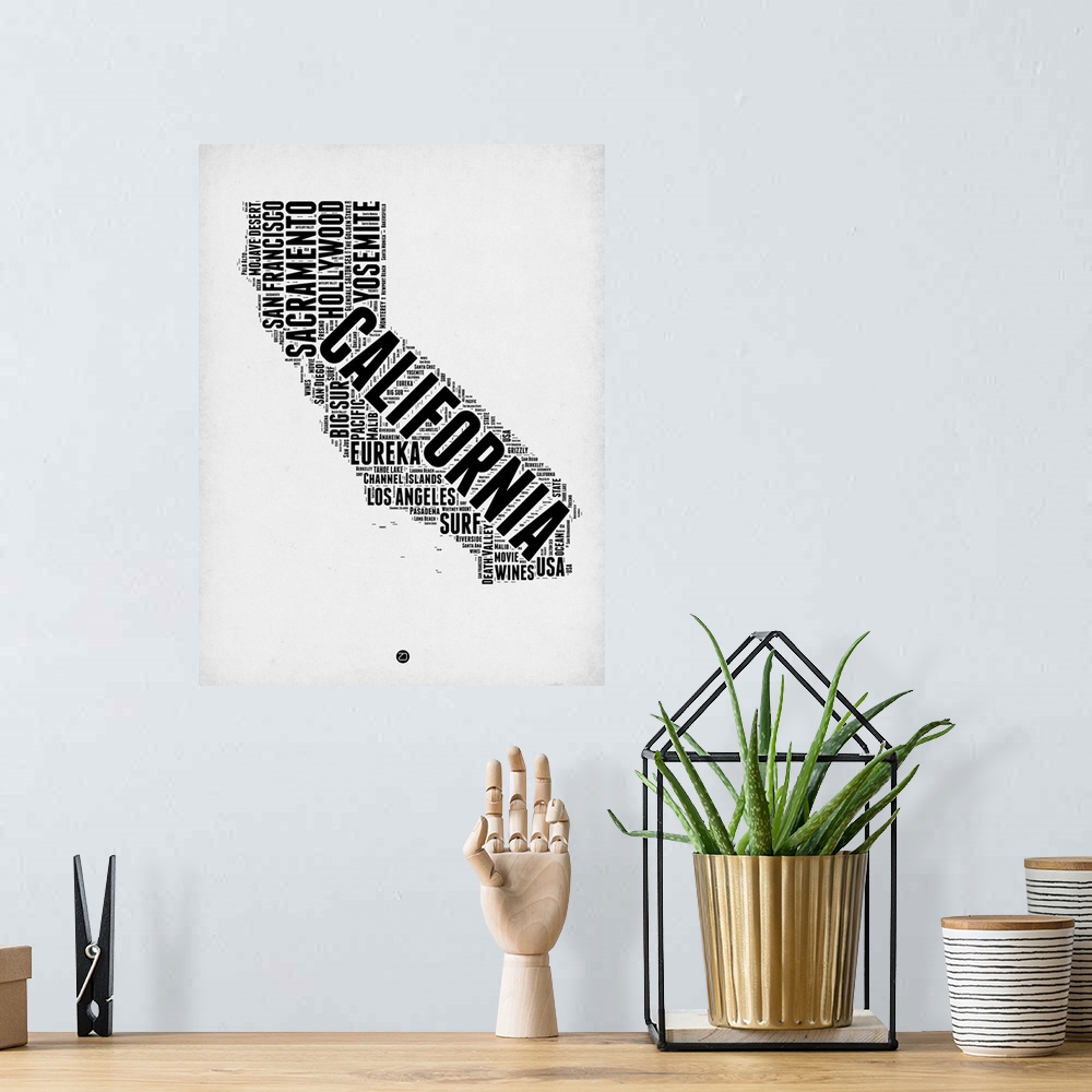 A bohemian room featuring Typography art map of the US state California.