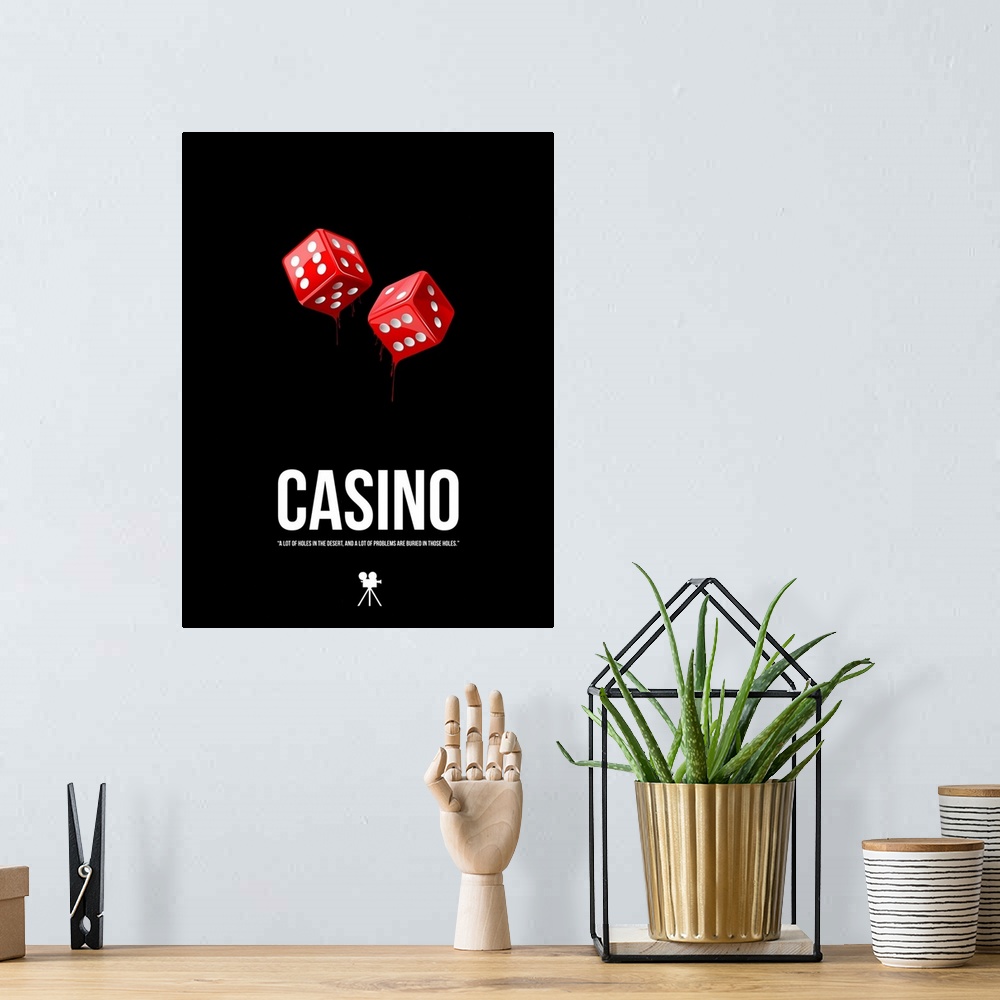 A bohemian room featuring A contemporary minimalist movie poster featuring a pair of dice and a quote from the movie