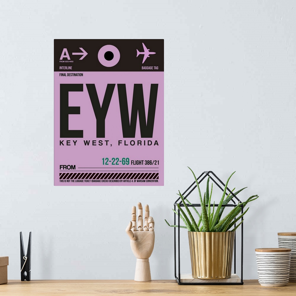 A bohemian room featuring EYW Key West Luggage Tag I