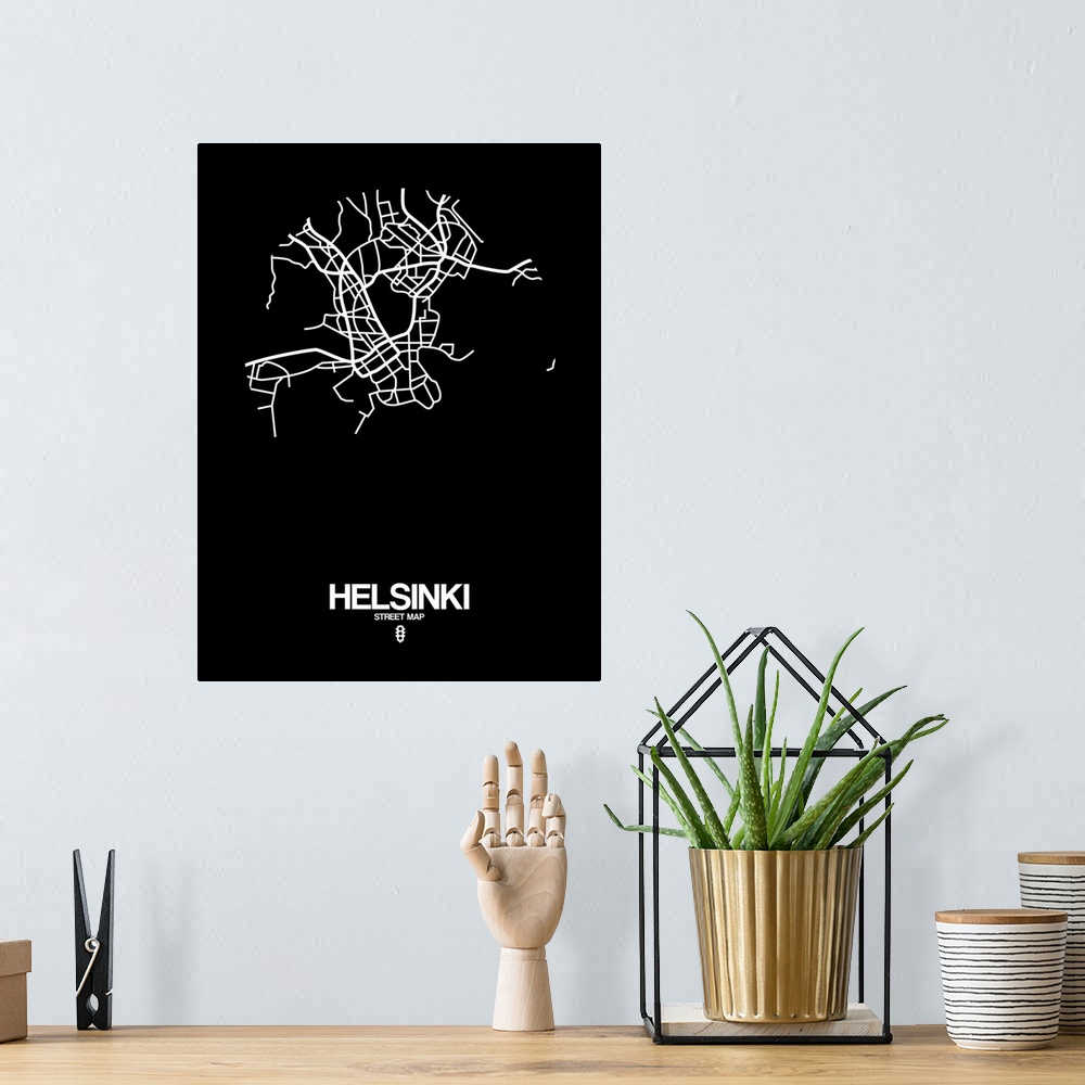 A bohemian room featuring Minimalist art map of the city streets of Helsinki in black and white.