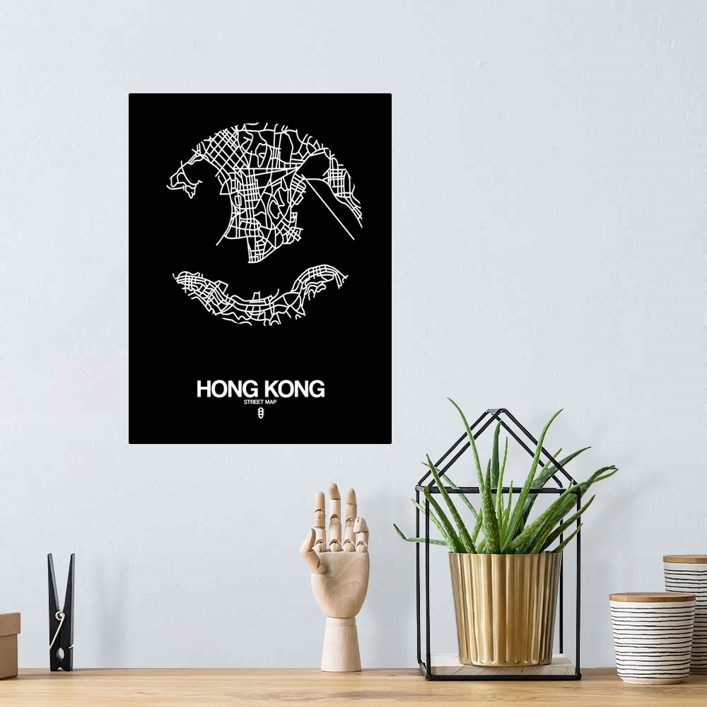A bohemian room featuring Minimalist art map of the city streets of Hong Kong in black and white.