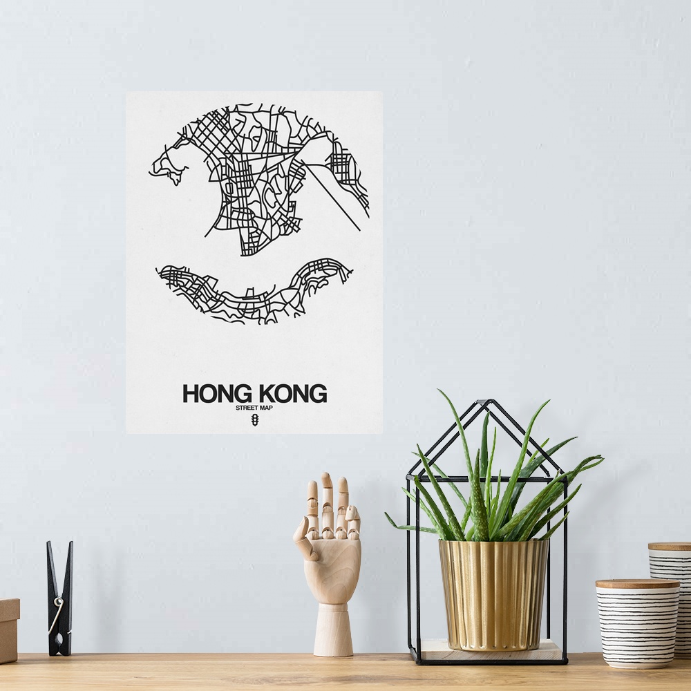A bohemian room featuring Minimalist art map of the city streets of Hong Kong in white and black.