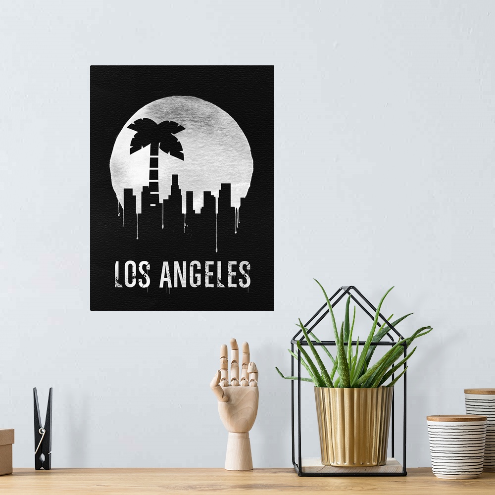 A bohemian room featuring Contemporary watercolor artwork of the Los Angeles skyline, in silhouette.