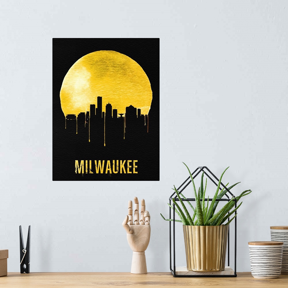 A bohemian room featuring Contemporary watercolor artwork of the Milwaukee city skyline, in silhouette.