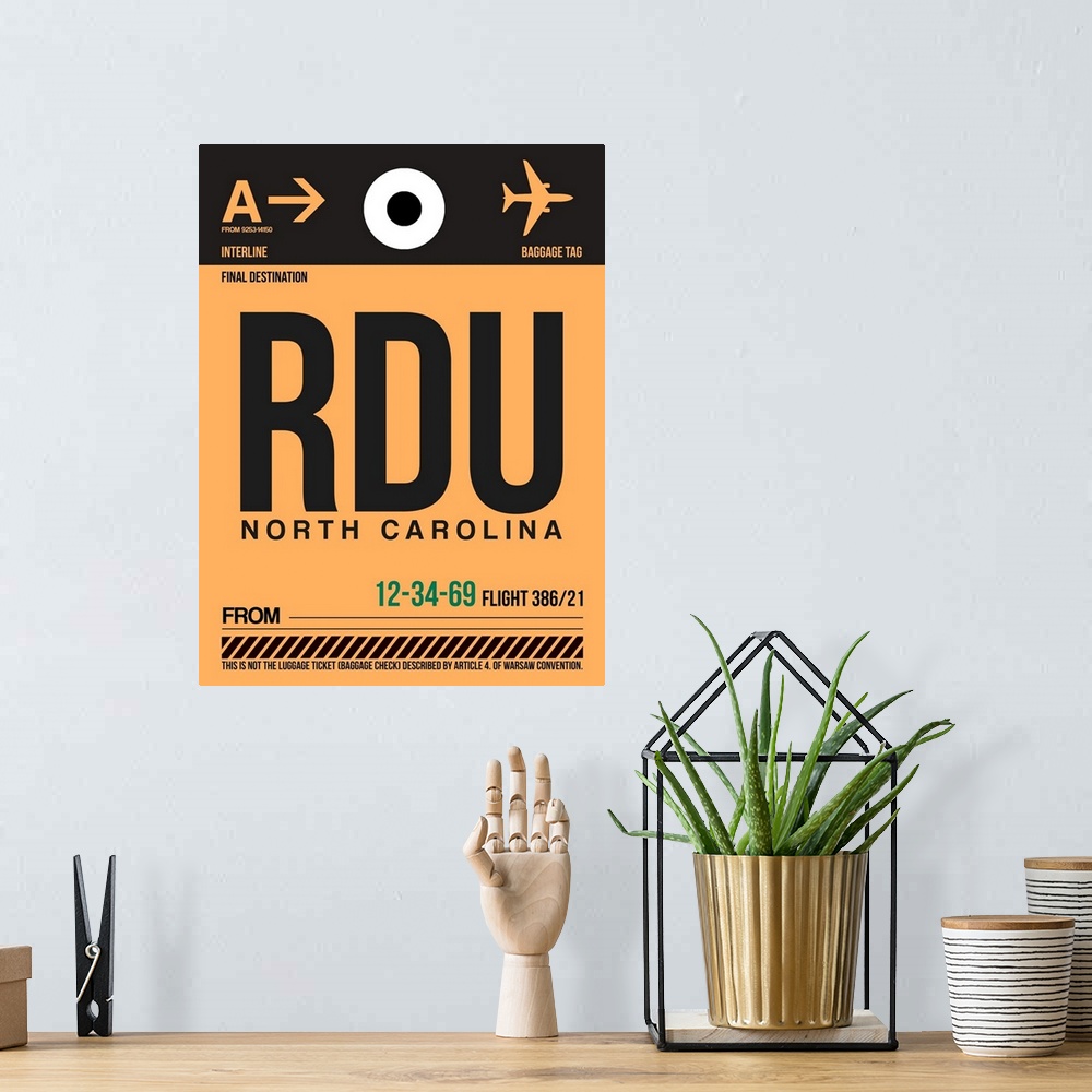 A bohemian room featuring RDU North Carolina Luggage Tag I