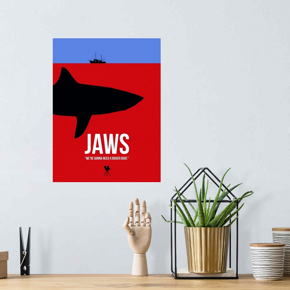 A bohemian room featuring Contemporary minimalist movie poster artwork of Jaws.