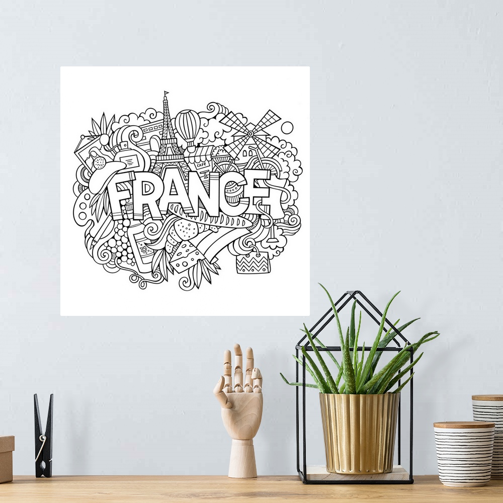 A bohemian room featuring Several French-themed objects, including the Eiffel Tower and pastries, surrounding the word "Fra...