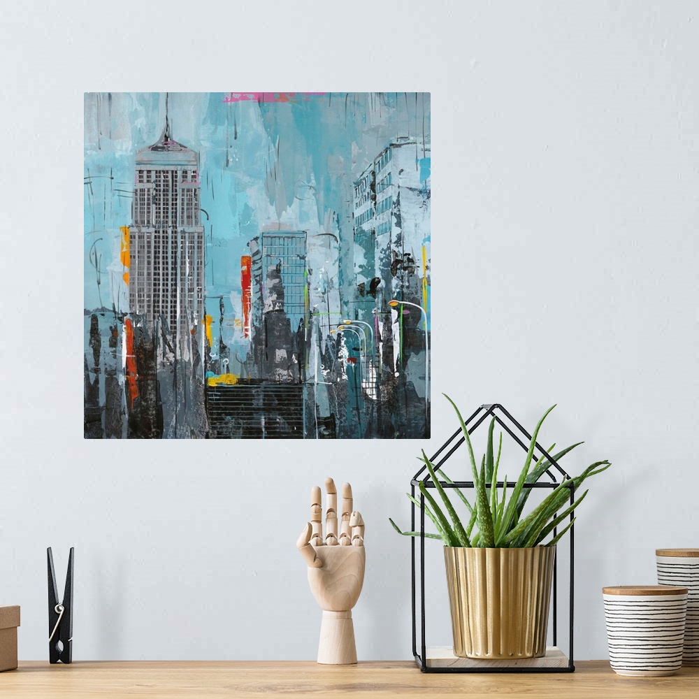 A bohemian room featuring Contemporary artwork of New York skyscrapers with pops of bright contrasting colors.