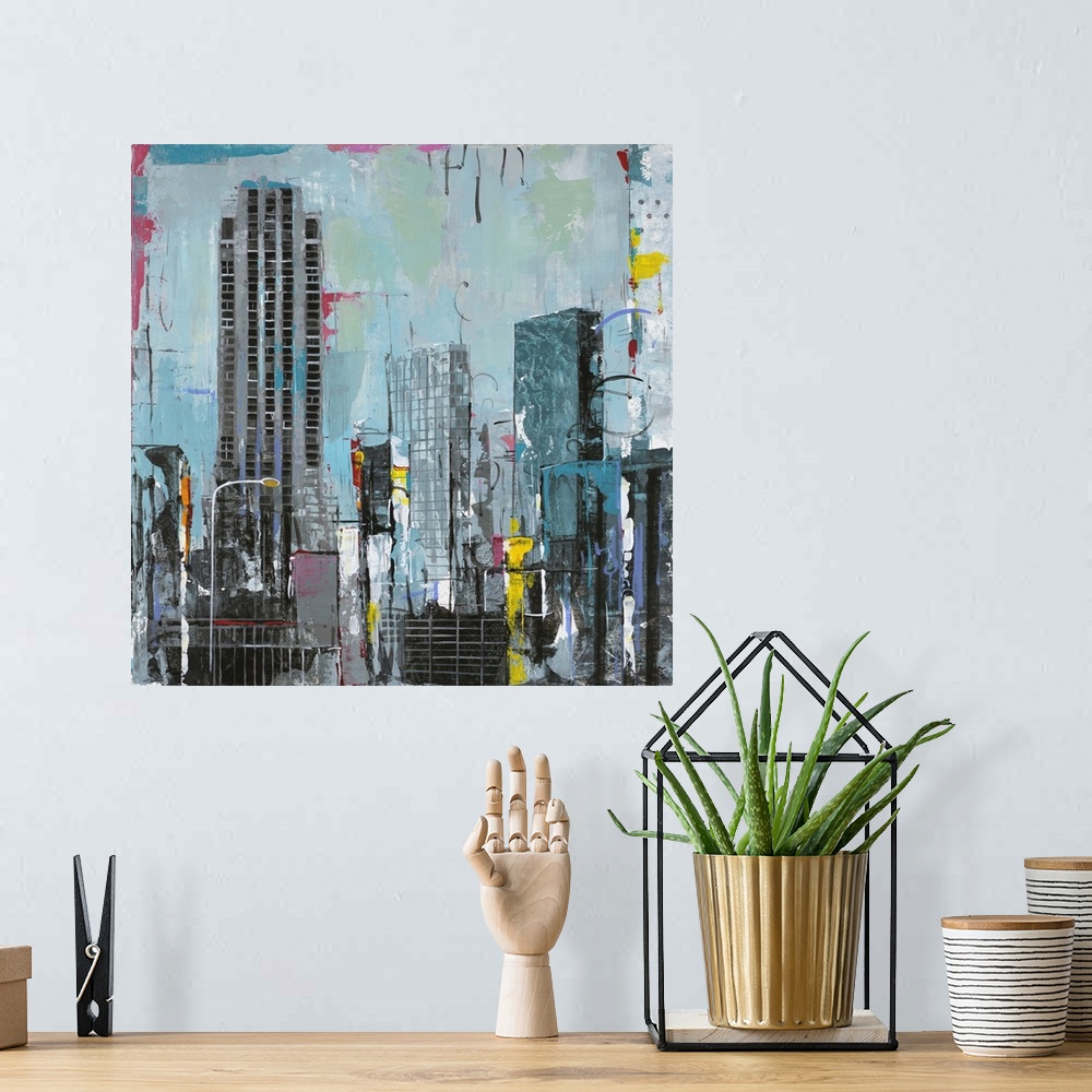 A bohemian room featuring Contemporary artwork of New York skyscrapers with pops of bright contrasting colors.