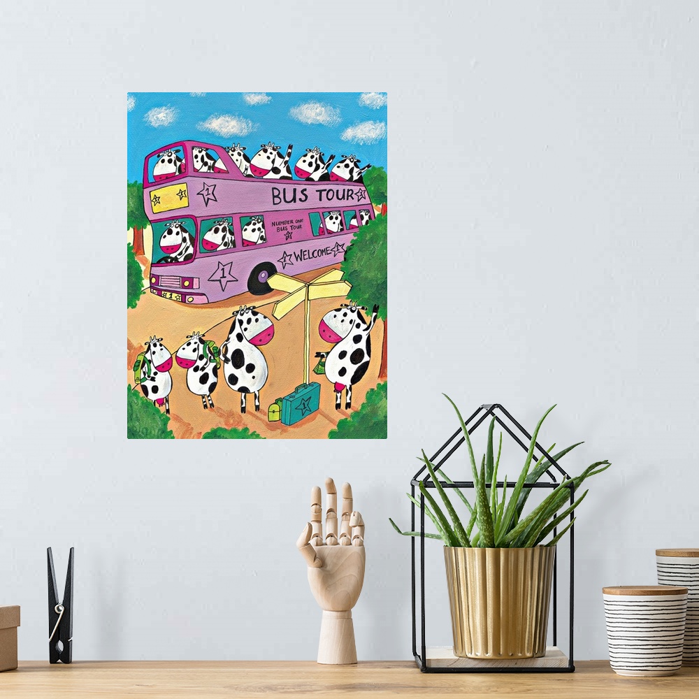 A bohemian room featuring Cows take a trip on the bus. Illustrated wall art by artist Carla Daly.