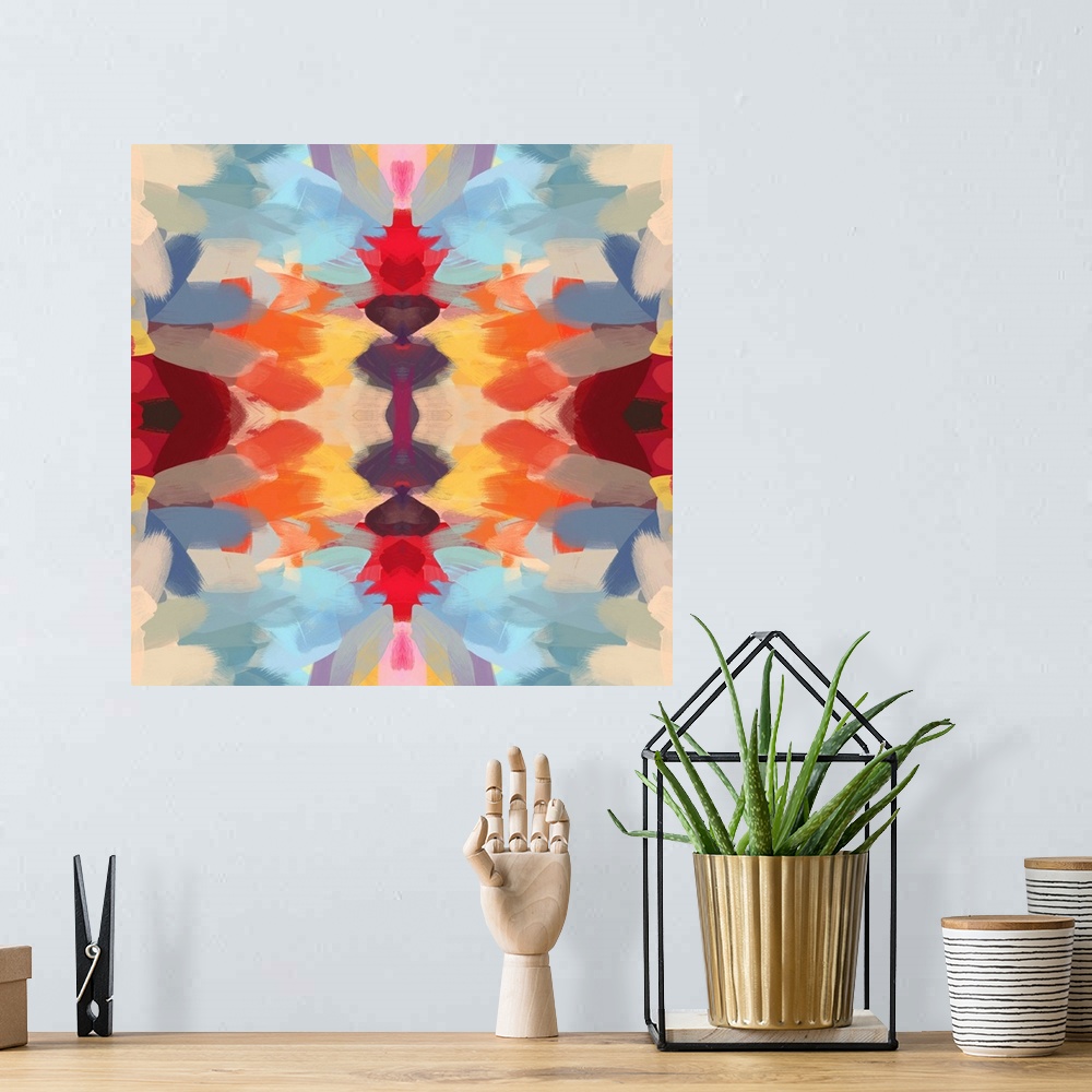 A bohemian room featuring Kaleidoscopic abstract pattern in shades of red, orange, and blue.