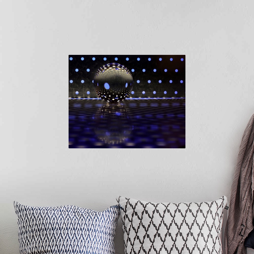 A bohemian room featuring A glass ball on a metal plate with blue dots of color reflecting.