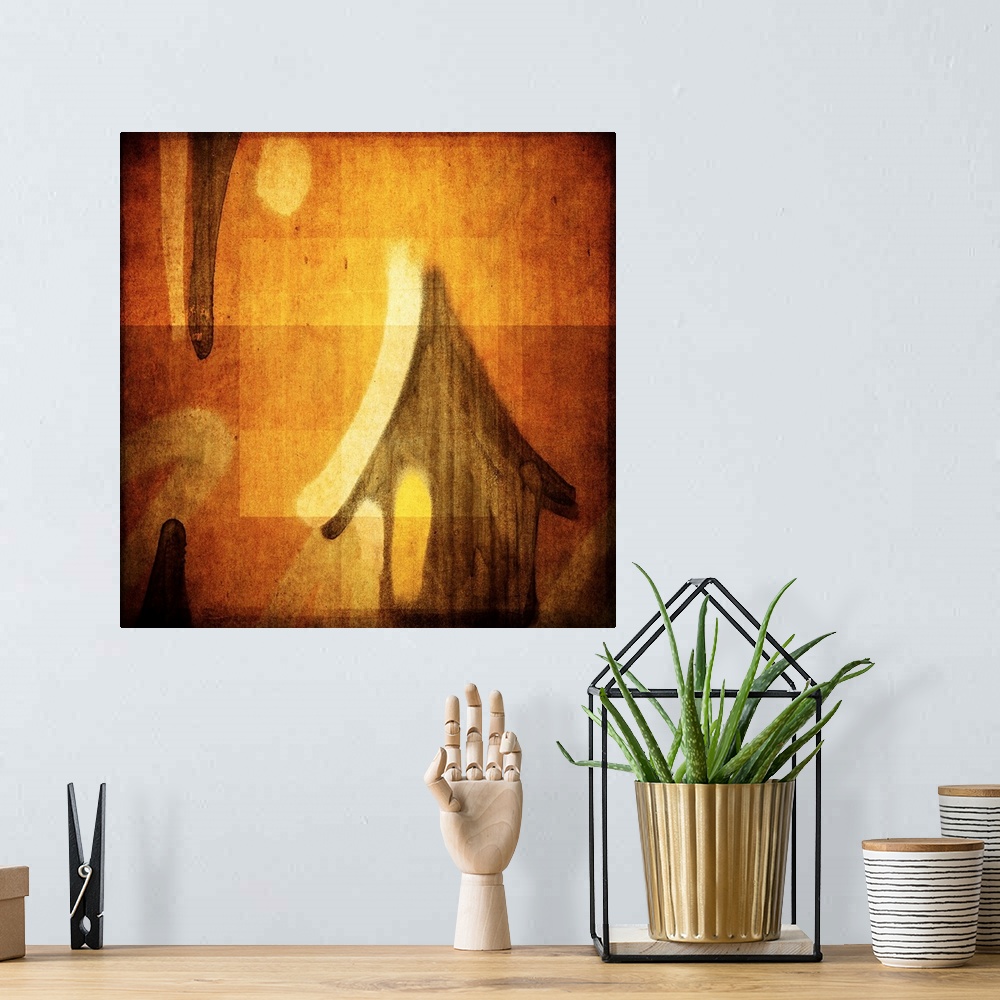 A bohemian room featuring Conceptual photograph of abstract shapes resembling a small house with the sun above in amber sha...