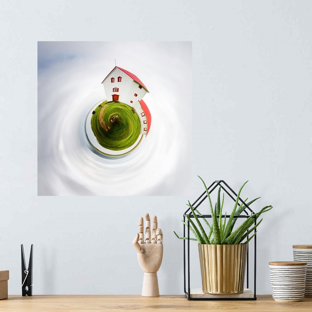 A bohemian room featuring A white house with a red roof on a green lawn, with a stereographic projection effect on the imag...