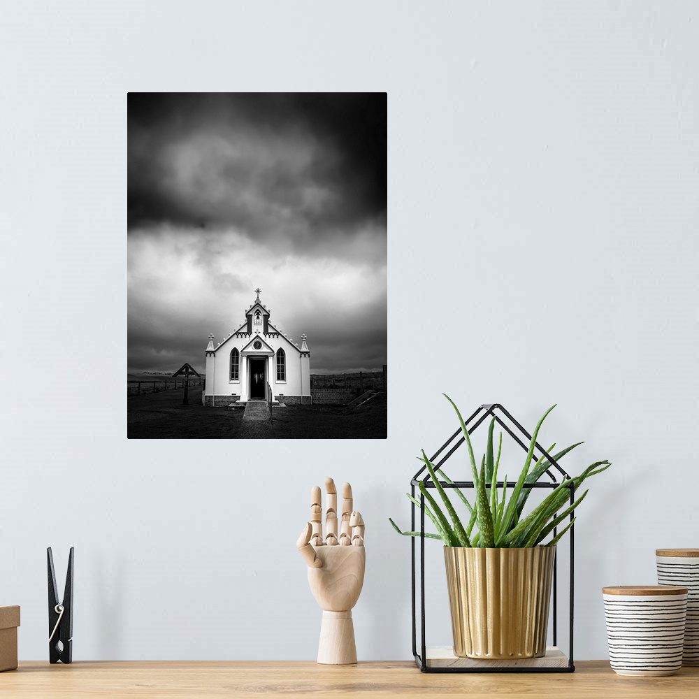 A bohemian room featuring Dramatic black and white fine art photography of The Italian Chapel on Orkney Island in Scotland.