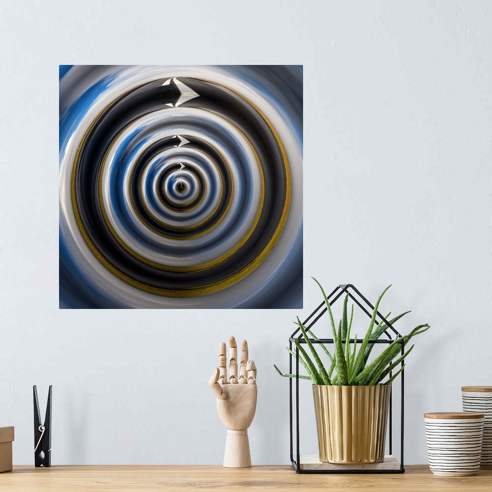 A bohemian room featuring Abstract artwork created by editing a photograph into a circular form.