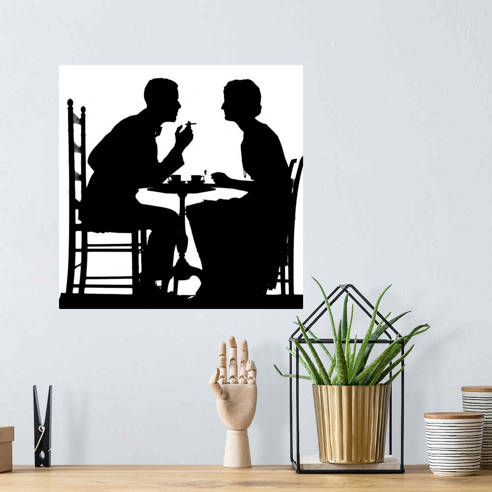 A bohemian room featuring 1930's Silhouette Of Couple Sitting At Tea Table