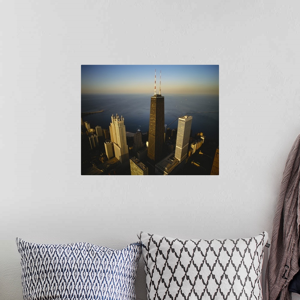A bohemian room featuring Large photo on canvas of an upclose view of buildings in downtown Chicago along the waterfront.