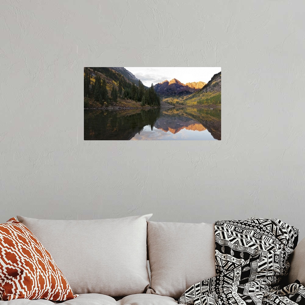 A bohemian room featuring Elk Mountains reflected in Maroon Bells Lake, Pitkin County, Colorado, USA.