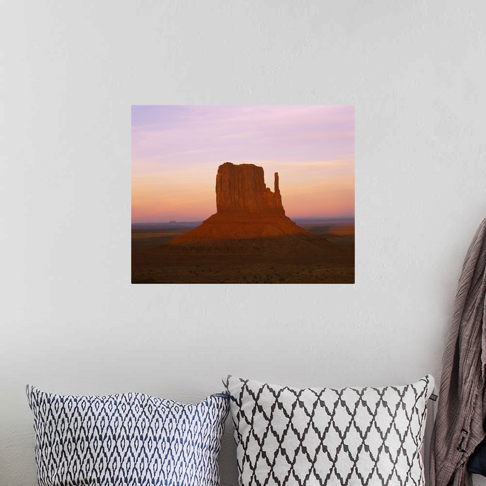 A bohemian room featuring Rock formations on a landscape, West Mitten, Monument Valley Tribal Park, Navajo, Arizona