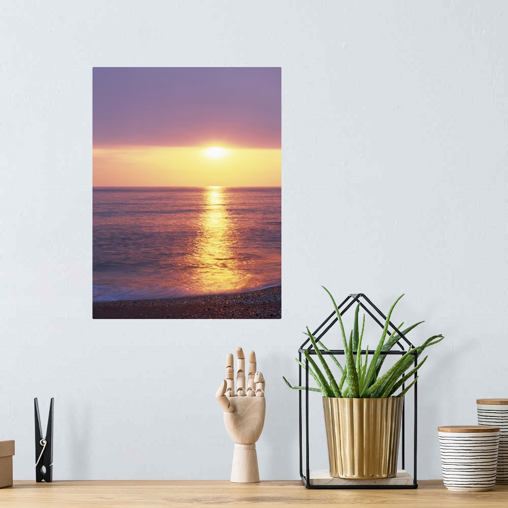 A bohemian room featuring Sunset over the sea