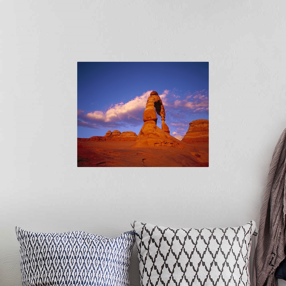 A bohemian room featuring Image of the red rock arch formations in the Utah desert beneath a clear sky.