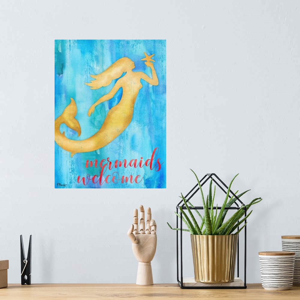 A bohemian room featuring Metallic gold silhouette of a mermaid holding a starfish on a blue watercolor background with "Me...