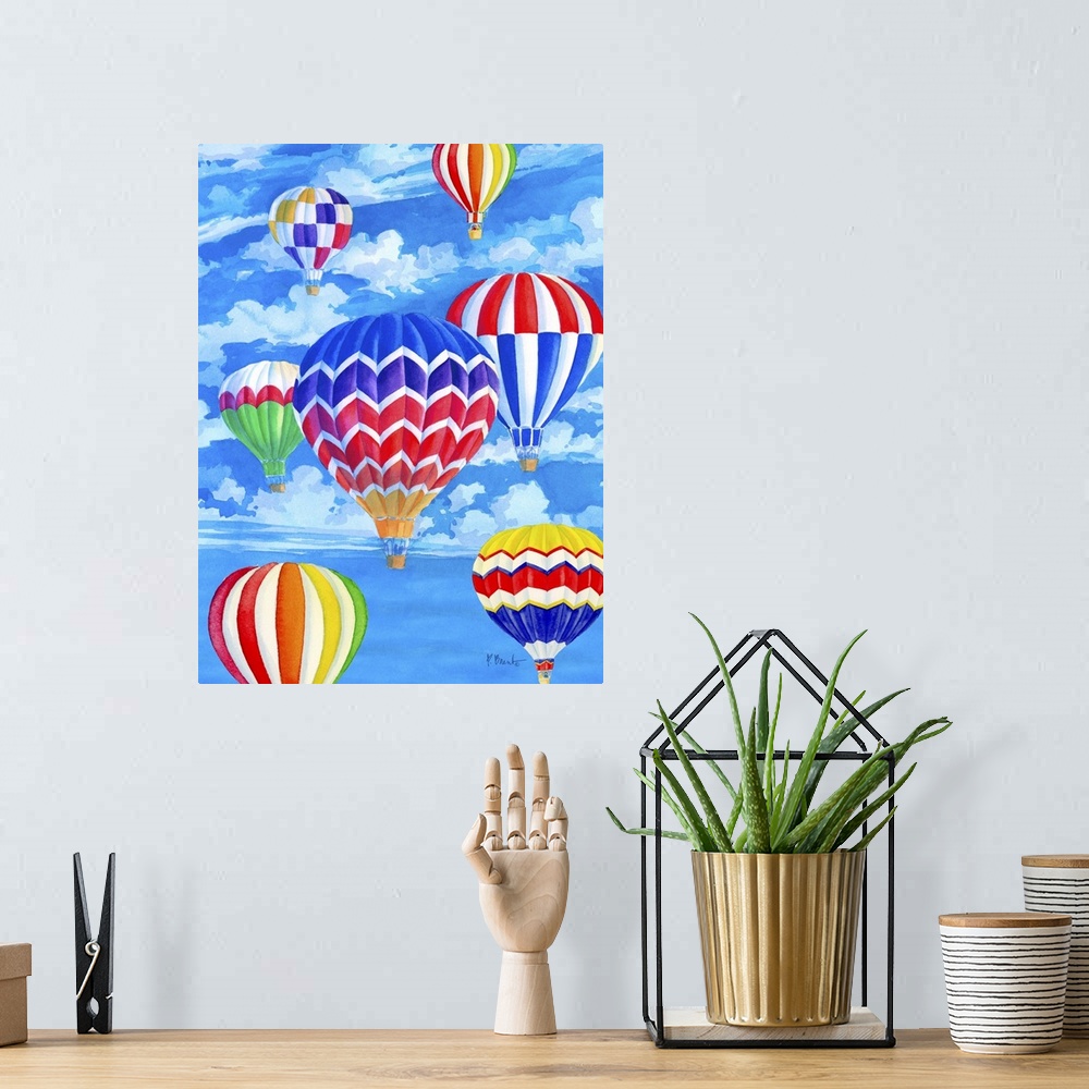 A bohemian room featuring Painting of a sky filled with hot air balloons with rainbow patterns.