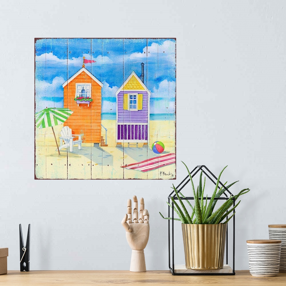 A bohemian room featuring Square decor of cute little beach huts with the ocean in the background on faux wood.