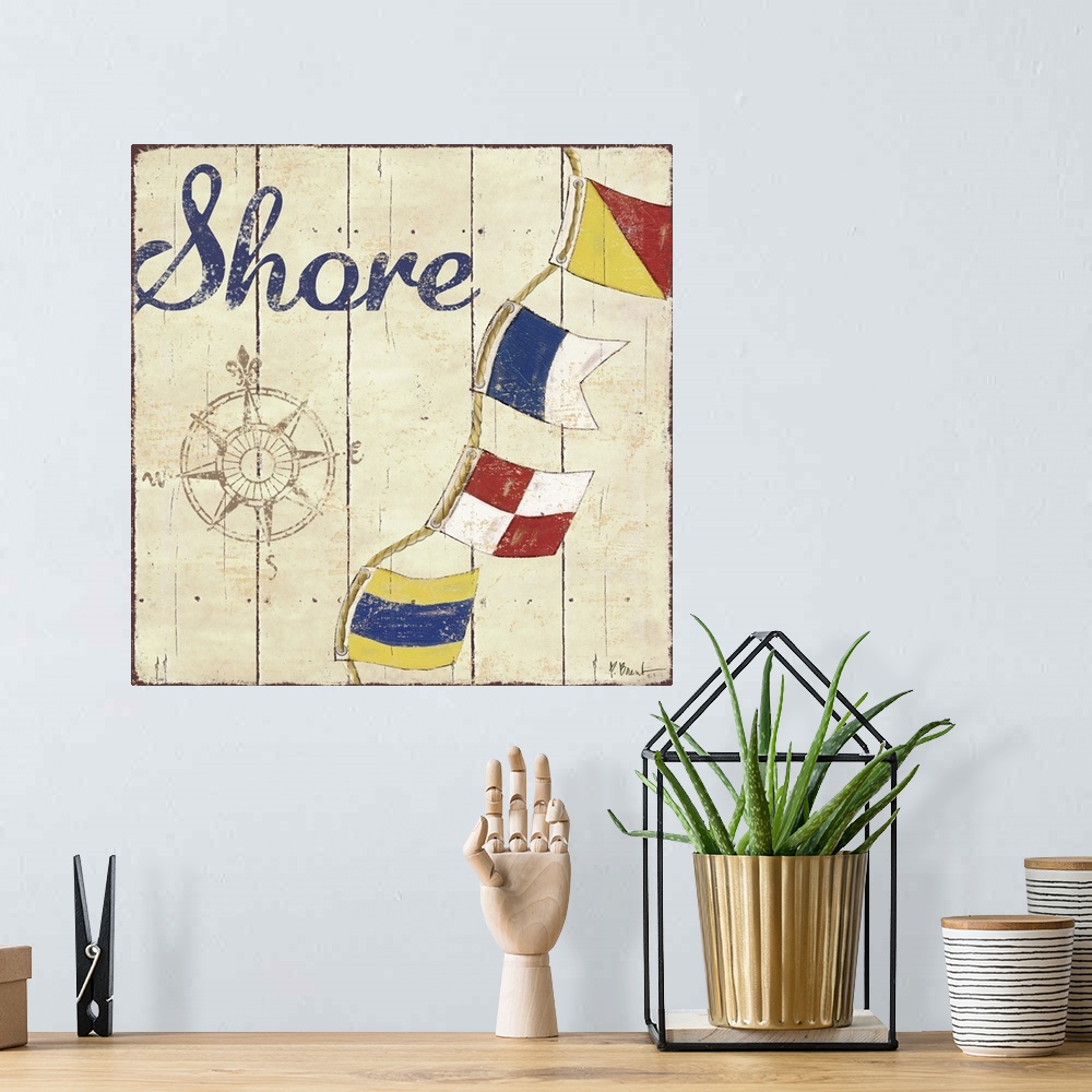 A bohemian room featuring Painted nautical sign on wood panels with a compass rose, flags, and the word Shore.