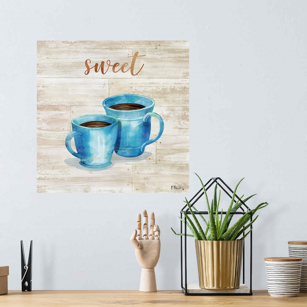 A bohemian room featuring Square decor with two mugs of coffee on a faux wood background with "sweet" written at the top.