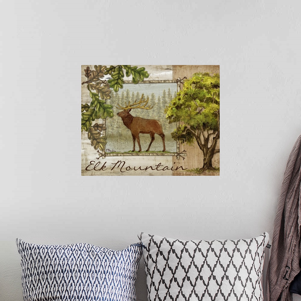 A bohemian room featuring Decorative artwork of an elk in a frame, with oak leaves, acorns, and the words Elk Mountain