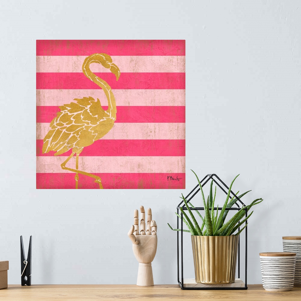 A bohemian room featuring Square decor with a metallic gold flamingo on a pink striped background.