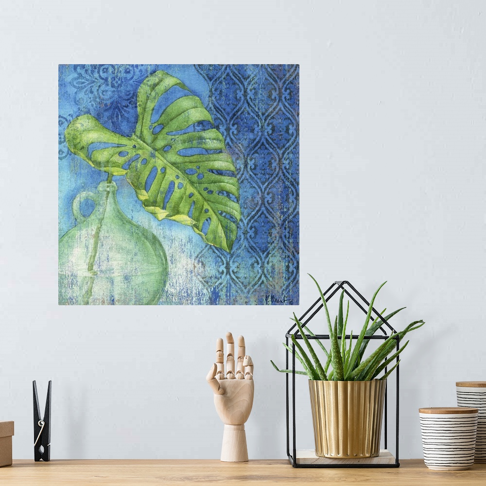 A bohemian room featuring Watercolor still life painting of a palm leaf in a round jug.