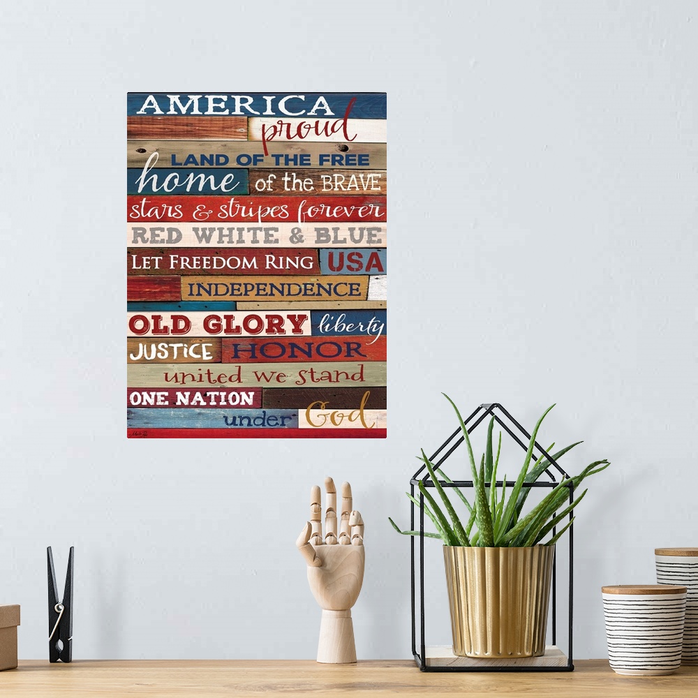 A bohemian room featuring Patriotic typography art against wooden surface in multiple colors.
