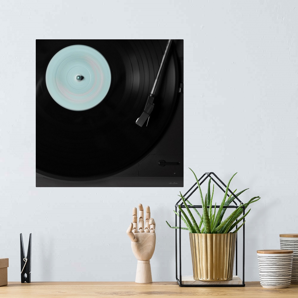 A bohemian room featuring Turntable Tune