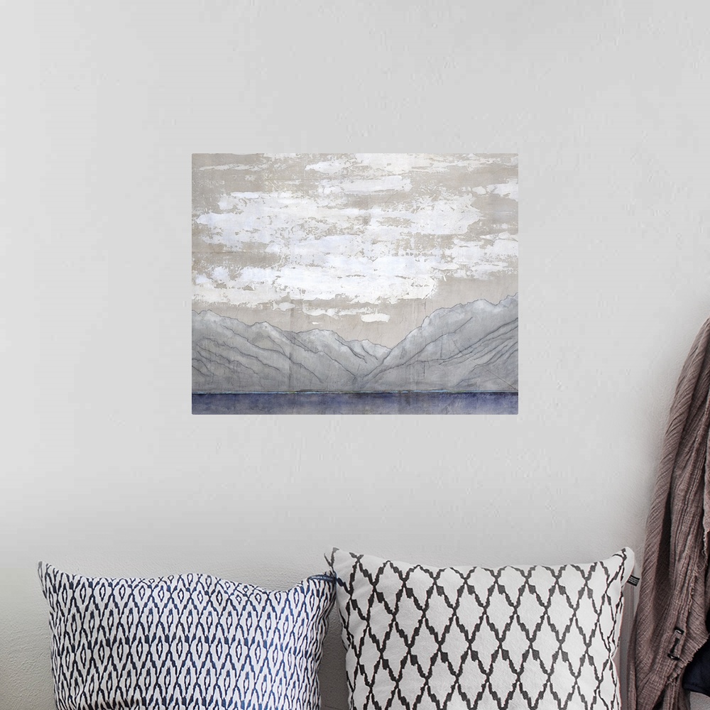 A bohemian room featuring Contemporary landscape painting of slightly washed out mountain range and textured clouds in fron...