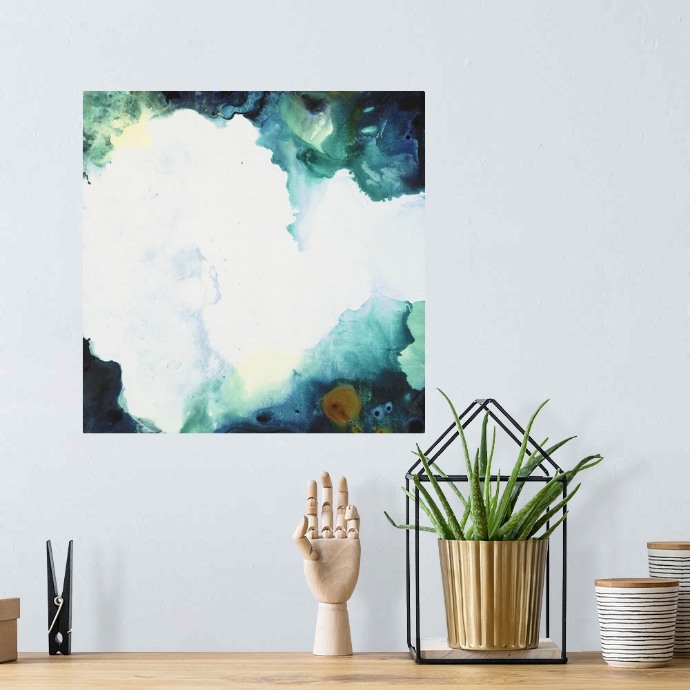A bohemian room featuring Square abstract art with a bright white splotch in the center and colors forming together around ...